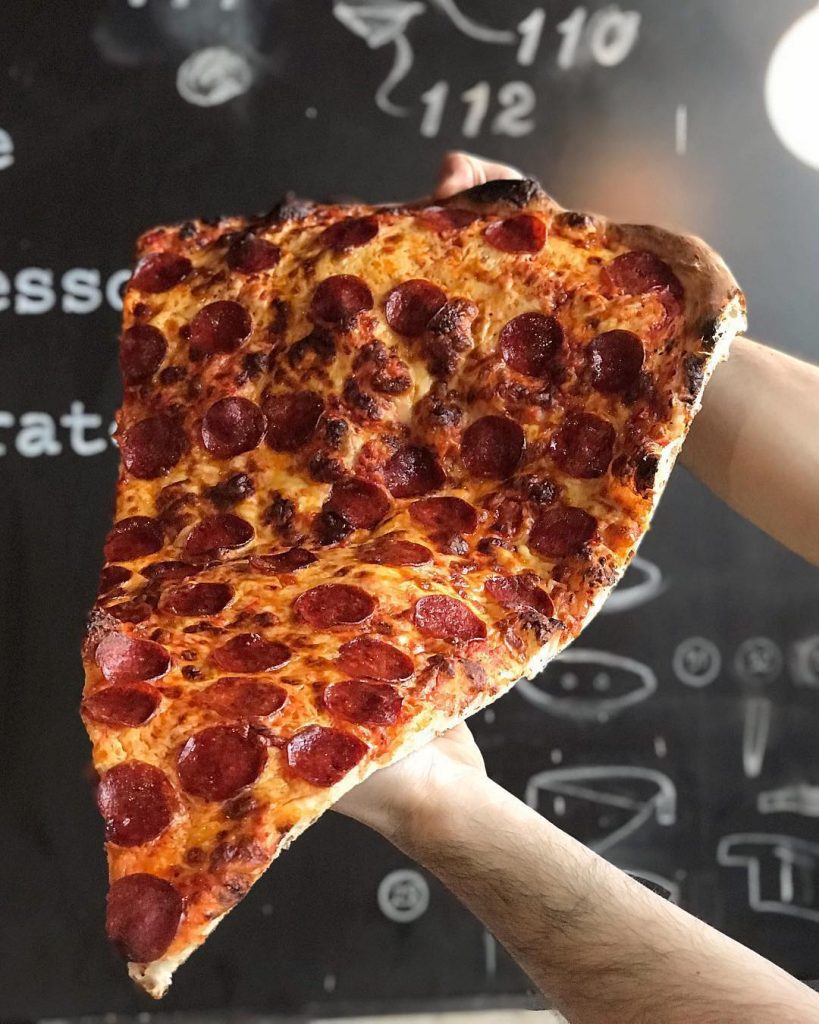 New Foodie Trend Is A Giant Pizza Slice – The Biggest You’ve Seen