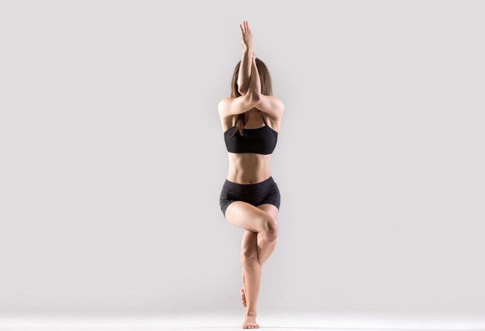 Eagle pose | 15 Morning Yoga Poses For Beginners | Her Beauty