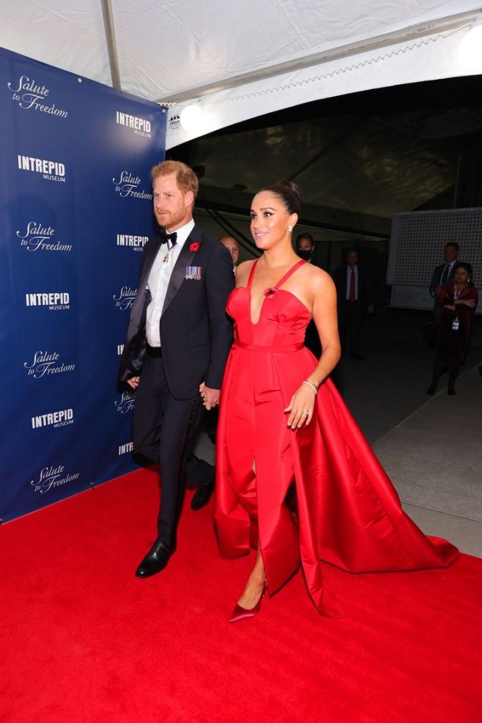 Meghan Markle Causes a Stir By Wearing A Daring Crimson Dress