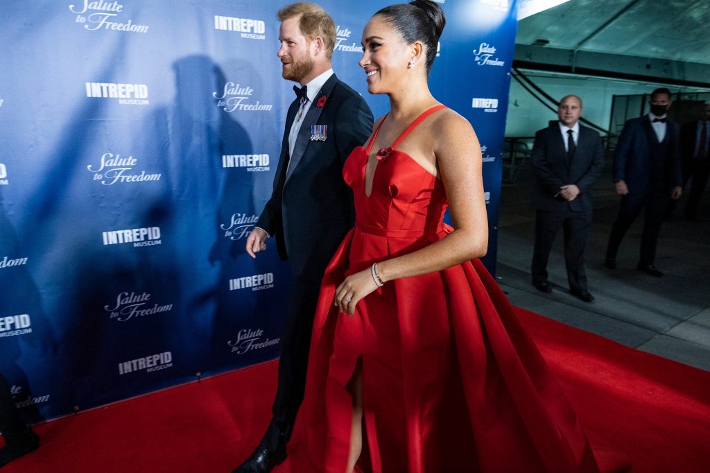 Meghan Markle Causes a Stir By Wearing A Daring Crimson Dress